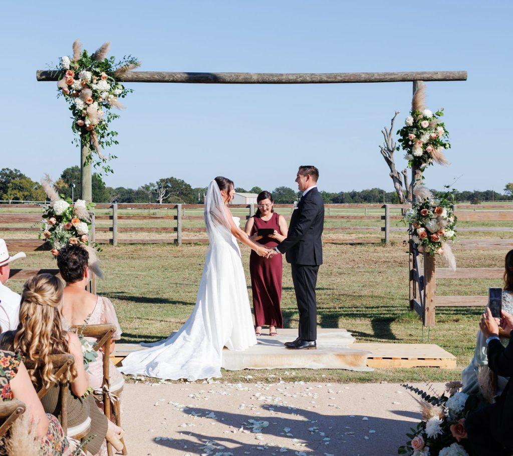 Bride and groom at ranch house