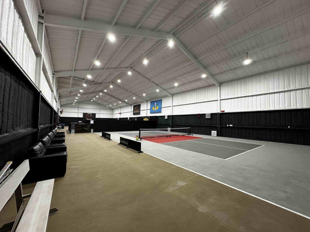 Indoor pickleball courts at 88888 Ranch